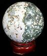 Unique Ocean Jasper Sphere - Crystal Cavities #32165-2
